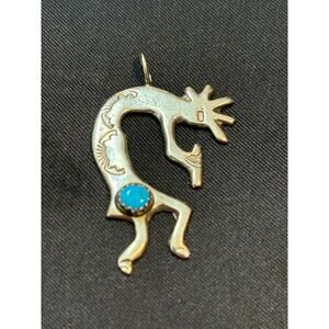 Vintage Sterling Silver Kokopelli Pendant With Turquoise Accent